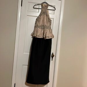 TERani couture black with nude peplum top adorned with  stones Gorgeous halter